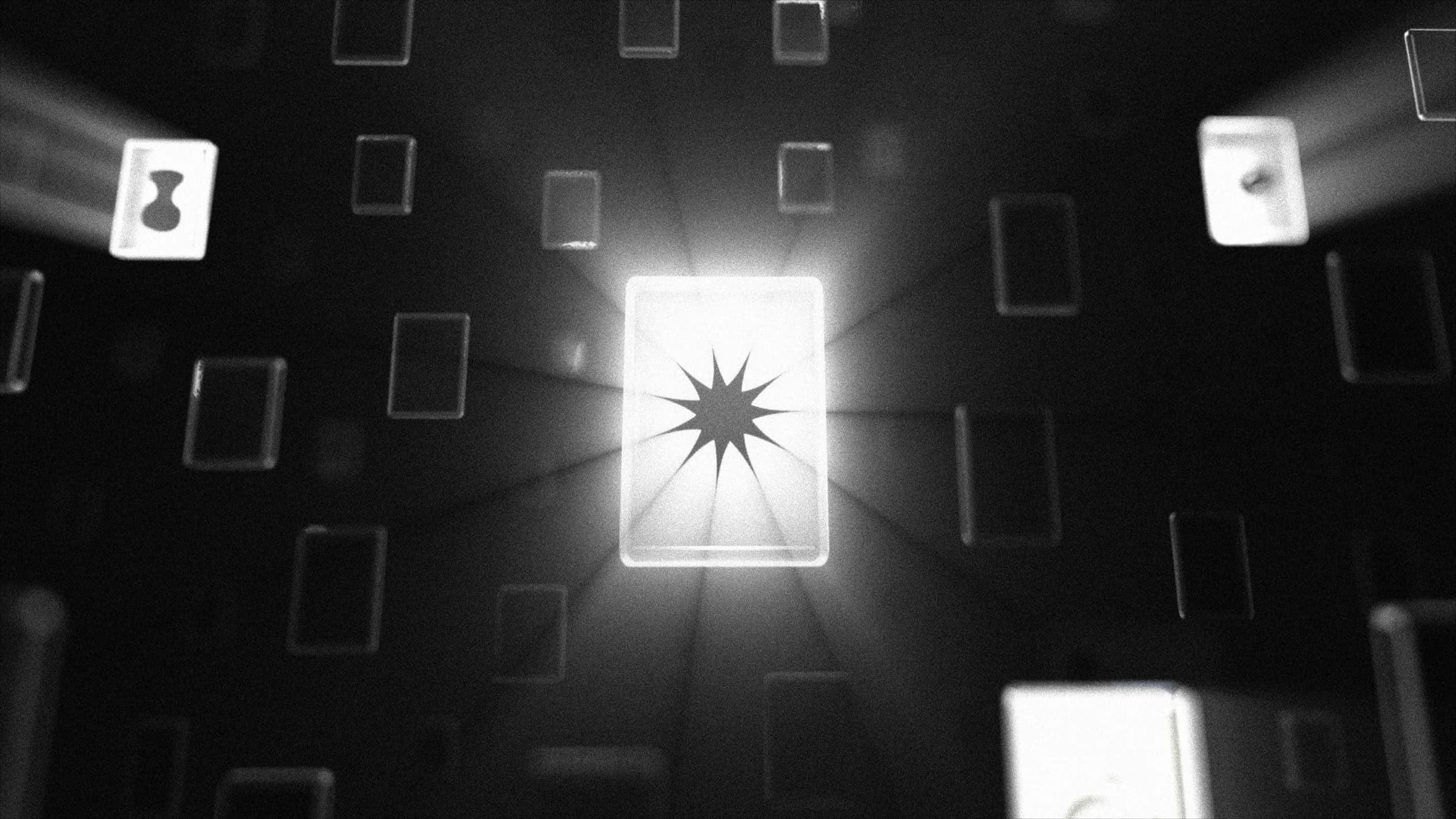 A single illuminated card standing out among many dark ones.